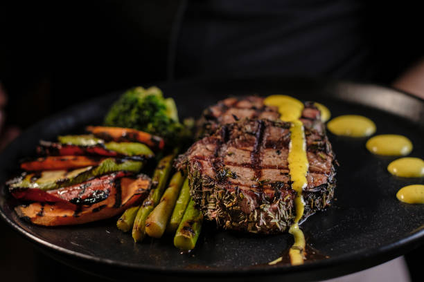 istock Grilled beef steak with asparagus and vegetables 1317138970