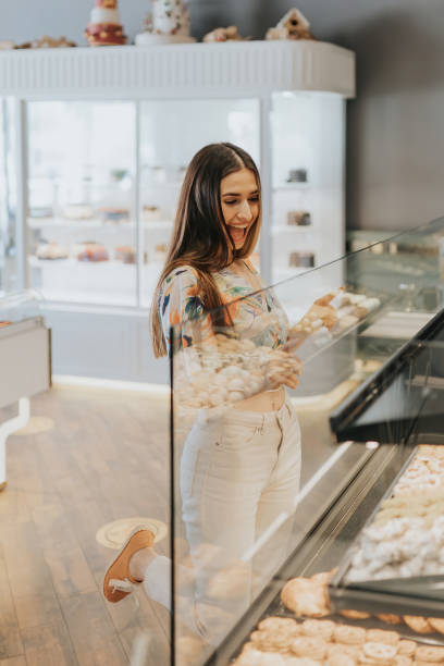 istock Young couple choosing at pastry counter 1317140479