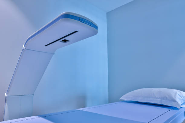istock Equipment X-ray equipment in modern hospital. Modern x-ray machine and Computerized Axial Tomography scanning in hospital. X-ray room in a hospital operating room with a classic ceiling-mounted x-ray 1317141533