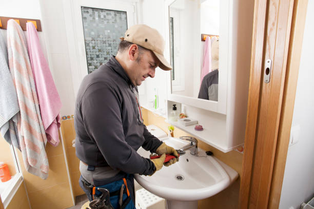 istock Plumber fixing bathroom faucet 1317142635