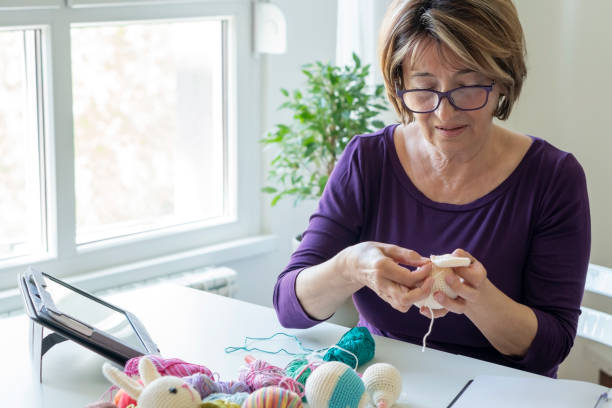 istock Senior woman working from home 1317142712