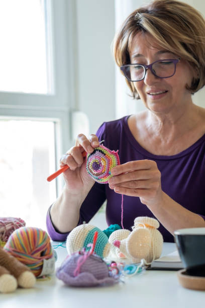 istock Senior woman working from home 1317142721