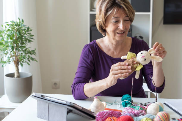 istock Senior woman working from home 1317142723