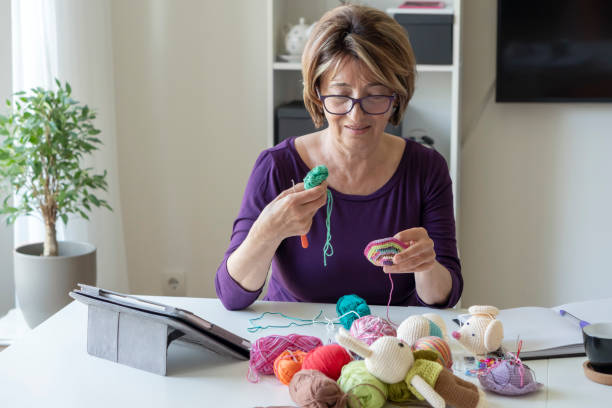 istock Senior woman working from home 1317142747