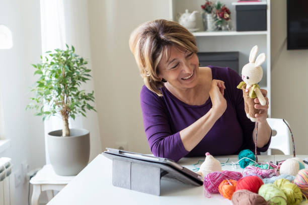 istock Senior woman working from home 1317142749