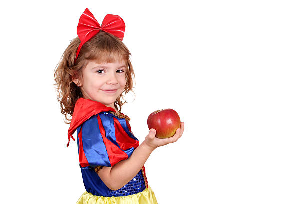 little girl with apple stock photo
