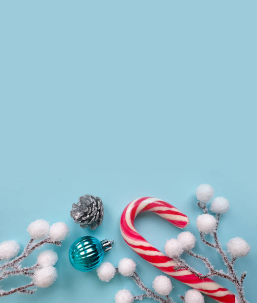 istock christmas, candy cane on a colored background 1317146615