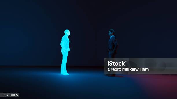 Man Meets Digital Avatar Of Himself Made With A Hologram Stock Photo - Download Image Now
