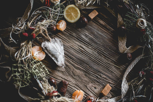istock Creative Christmas wreath with sweets. An unusual idea for a holiday home decor. Natural interior decor on wooden background. 1317151937