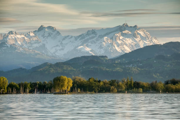 Sunset over the Laake Constance with the Swiss Mountains Sunset over the Laake Constance with the Swiss Mountains in the Background, Vorarlberg, Austria, Europe bregenz stock pictures, royalty-free photos & images