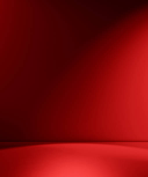 istock Beams of spotlight on a red background 1317160095