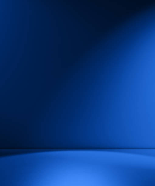 istock Beams of spotlight on a royal blue background 1317160133