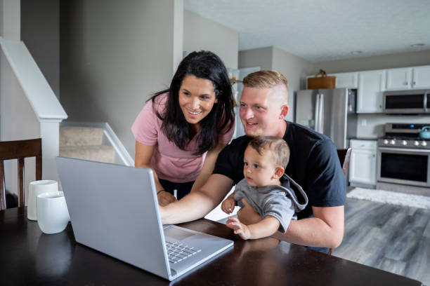 istock Young adults work remotely from home while enjoying morning coffee 1317160283