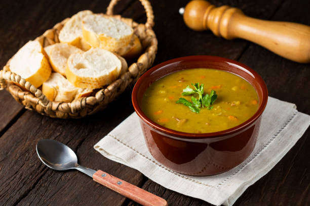 istock Pea soup. Bowl with pea soup on the table 1317160291
