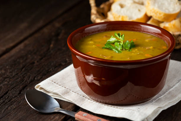 istock Pea soup. Bowl with pea soup on the table 1317160294
