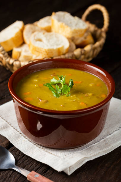 istock Pea soup. Bowl with pea soup on the table 1317160299