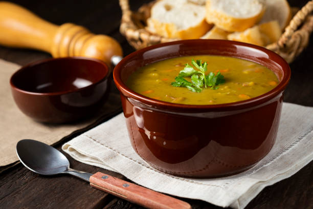 istock Pea soup. Bowl with pea soup on the table 1317160301