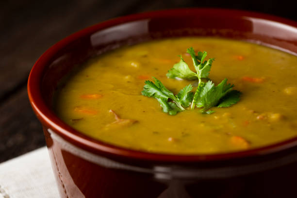 istock Pea soup. Bowl with pea soup on the table 1317160306