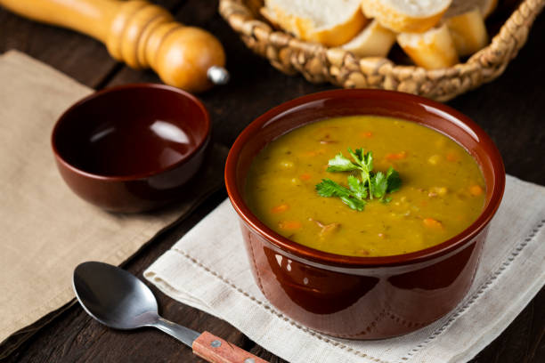 istock Pea soup. Bowl with pea soup on the table 1317160310