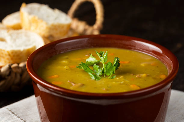 istock Pea soup. Bowl with pea soup on the table 1317160312