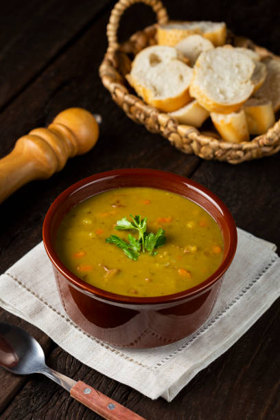 istock Pea soup. Bowl with pea soup on the table 1317160321