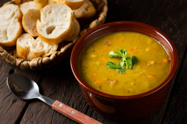 istock Pea soup. Bowl with pea soup on the table 1317160323
