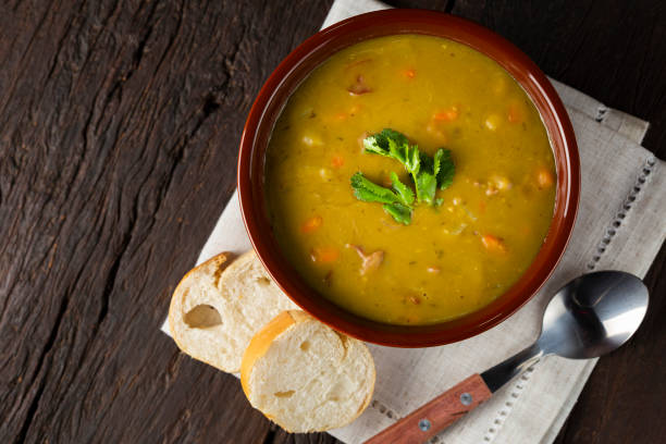 istock Pea soup. Bowl with pea soup on the table 1317160330