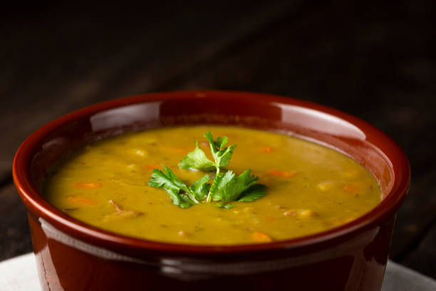 istock Pea soup. Bowl with pea soup on the table 1317160338
