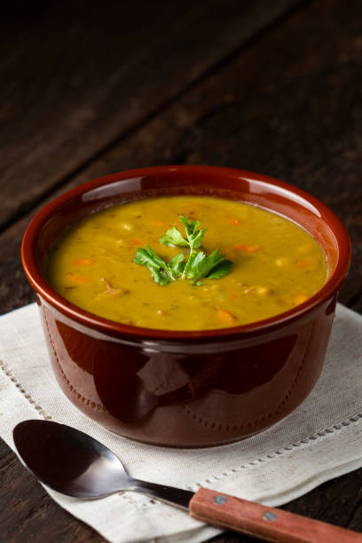 istock Pea soup. Bowl with pea soup on the table 1317160345