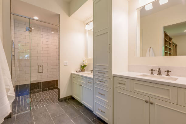 istock Bathroom with white and gray colors and subway tile in shower 1317163645