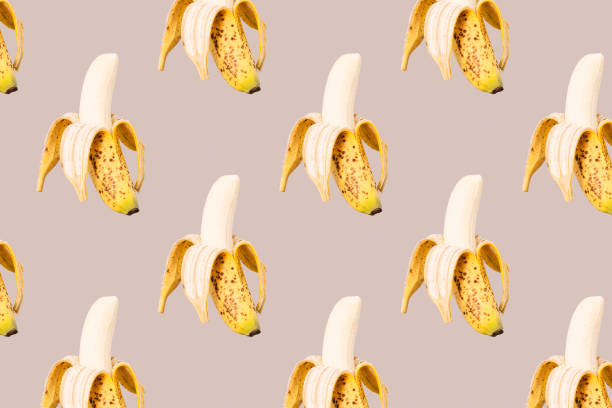 Isolated repetitive banana background on gray