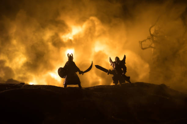 istock Medieval battle scene with cavalry and infantry. Silhouettes of figures as separate objects, fight between warriors on dark toned foggy background with medieval castle. 1317165734