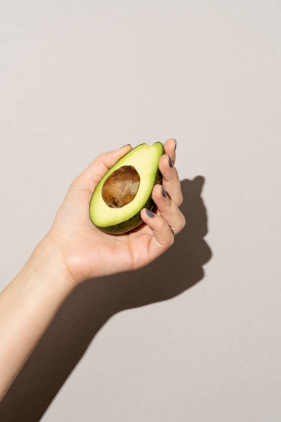 Avocado Shadow Stock Photos, Pictures & Royalty-Free Images - iStock