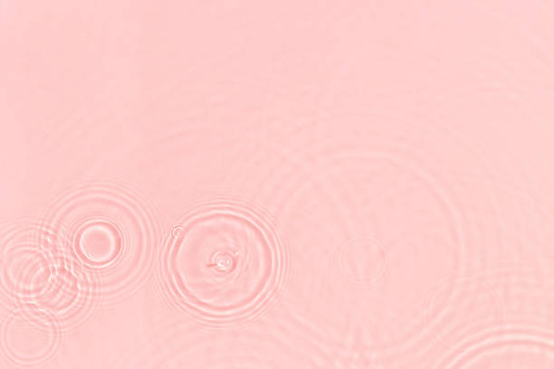 istock pink transparent clear water surface texture summer background 1317167796