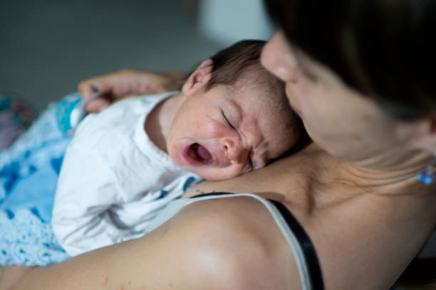 istock newborn baby and his mother 1317172855