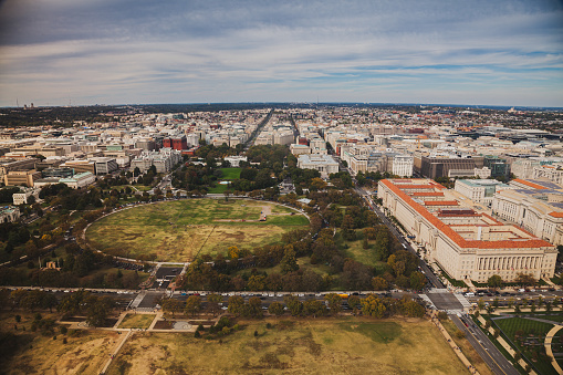 Washington DC from 500 foot height. Aerial view of downtown Washington, DC including The White House, The Ellipse, The White House South Lawn, U.S. Department of Commerce, Eisenhower Executive Office Building. Evening. October 19, 2019. Washington DC. USA