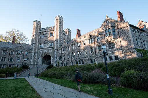 Princeton, USA - May 1, 2021. Students walking in the campus of Princeton University, Princeton, New Jersey, USA.