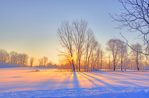 Sunrise over a snow covered farm field-Howard County, Indiana