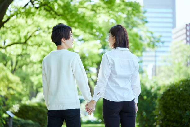 istock Hands of a couple holding hands 1317207890