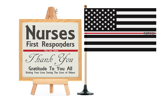 Thank You First Responders white board on wood easel next to Nurse Thin Line Flag on white background
