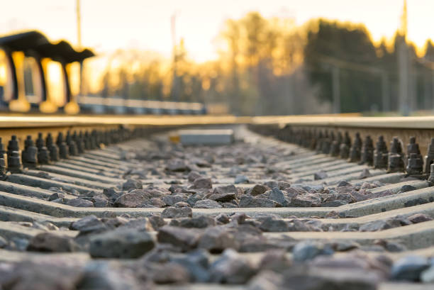 istock railroad rails on concrete sleepers. updated railway for high-speed, express train railway 1317211384