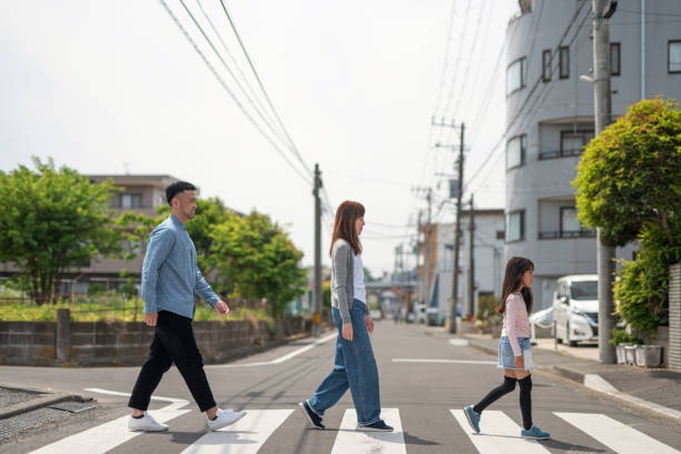istock Family walking in residential district 1317211781