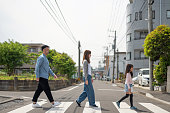 Family walking in residential district