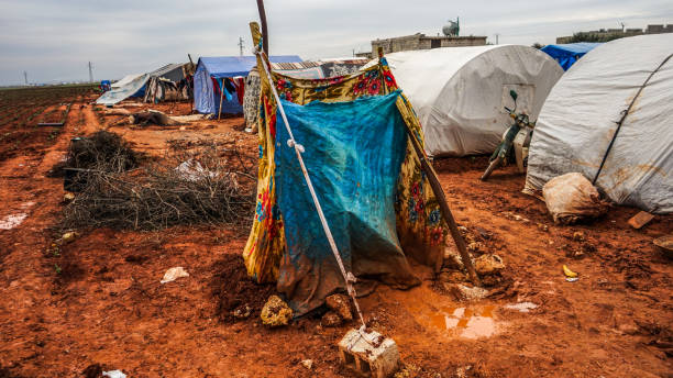 istock Refugee tents in the rain 1317212716