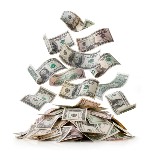 istock Dollars raining down on a bunch of money 1317215563
