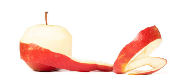 istock Peeling an apple, isolated over white background 1317216993