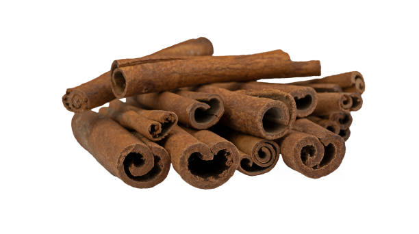 istock A bunch of cinnamon sticks isolated on a white background. Aromatic spices. Stack of Cinnamon stick selective focus 1317219765