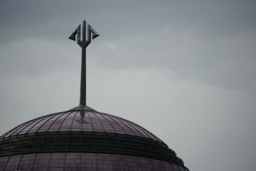 Purple dome of mosque. Moody scene. Backgrounds. Symbol religion