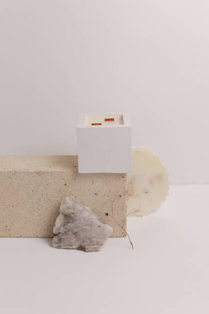 istock scented candles on off white background in rock holder 1317220872