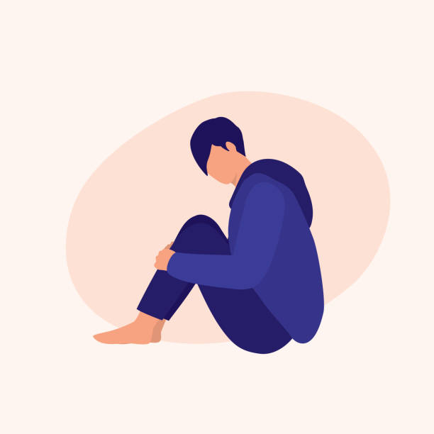 Young Sad Man Sitting. Mental Illness Concept. Vector Flat Cartoon Illustration. Depression Man Looking Down. hugging knees stock illustrations